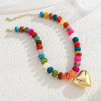 Colorful beaded necklace with gold heart pendant